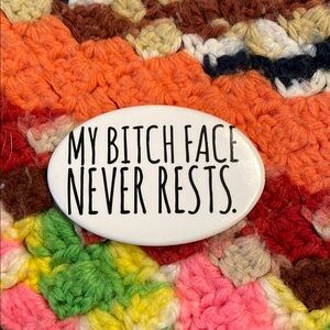 White Oval Pin with Bold Text